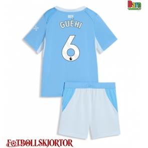 Manchester City Marc Guehi #6 Hemmakläder Barn 2026-27 Kortärmad (+ Korta byxor)